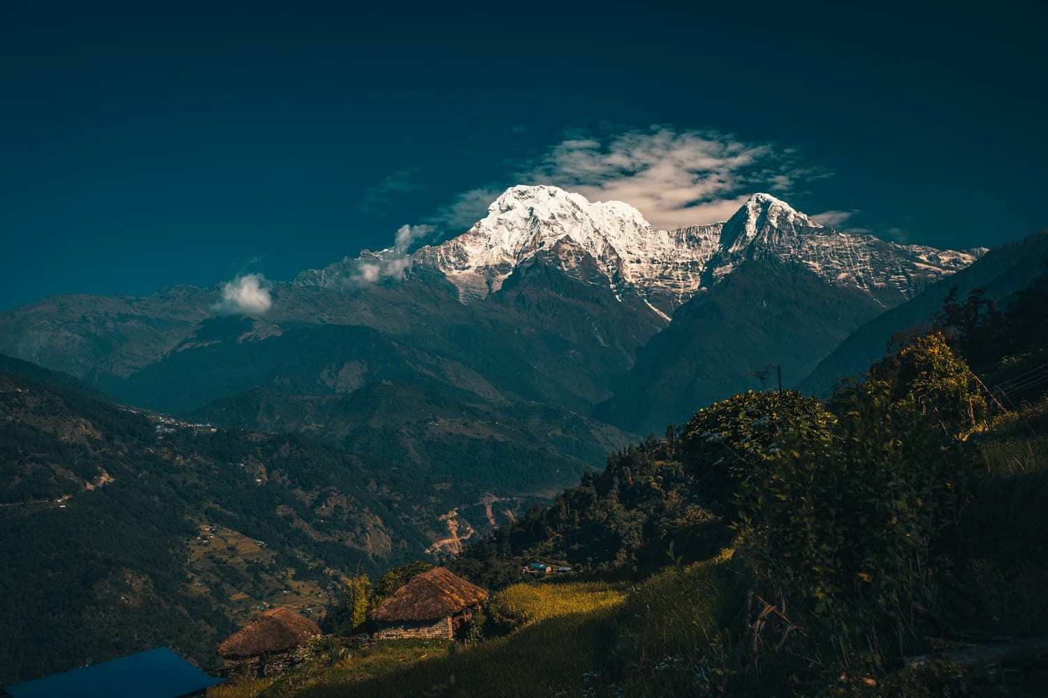 Snow-capped Annapurna South above terraced Nepali hill villages